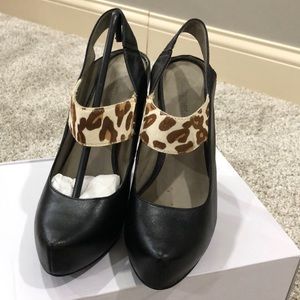 Gunmetal sling back pointed toe heels